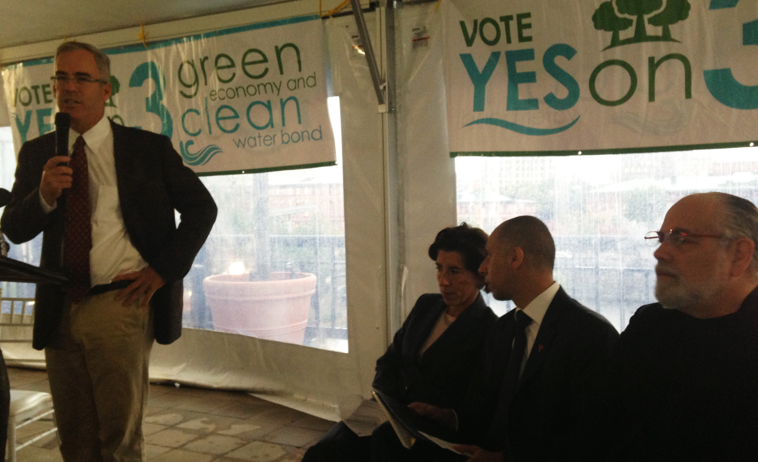 Jonathan Stone, left, executive director of Save The Bay, kicks off the Yes on 3 campaign on Friday, Oct. 12, including comments by Gov. Gina Raimondo, second from left, Providence Mayor Jorge Elorza, third from left, and Barnaby Evans, the creative director of WaterFire.